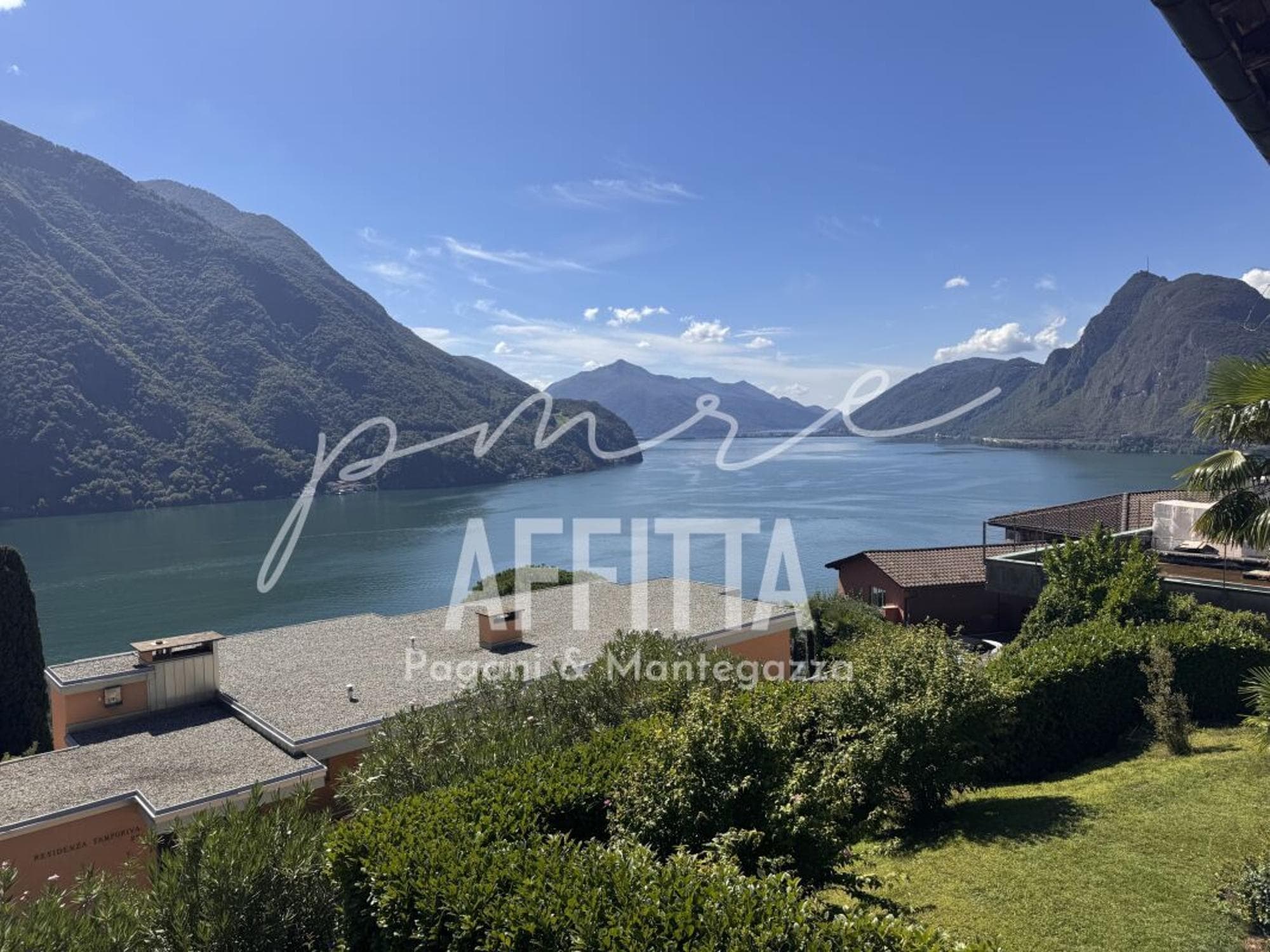 CASTAGNOLA | AFFITASI CASA A SCHIERA CON GIARDINO E VISTA LAGO