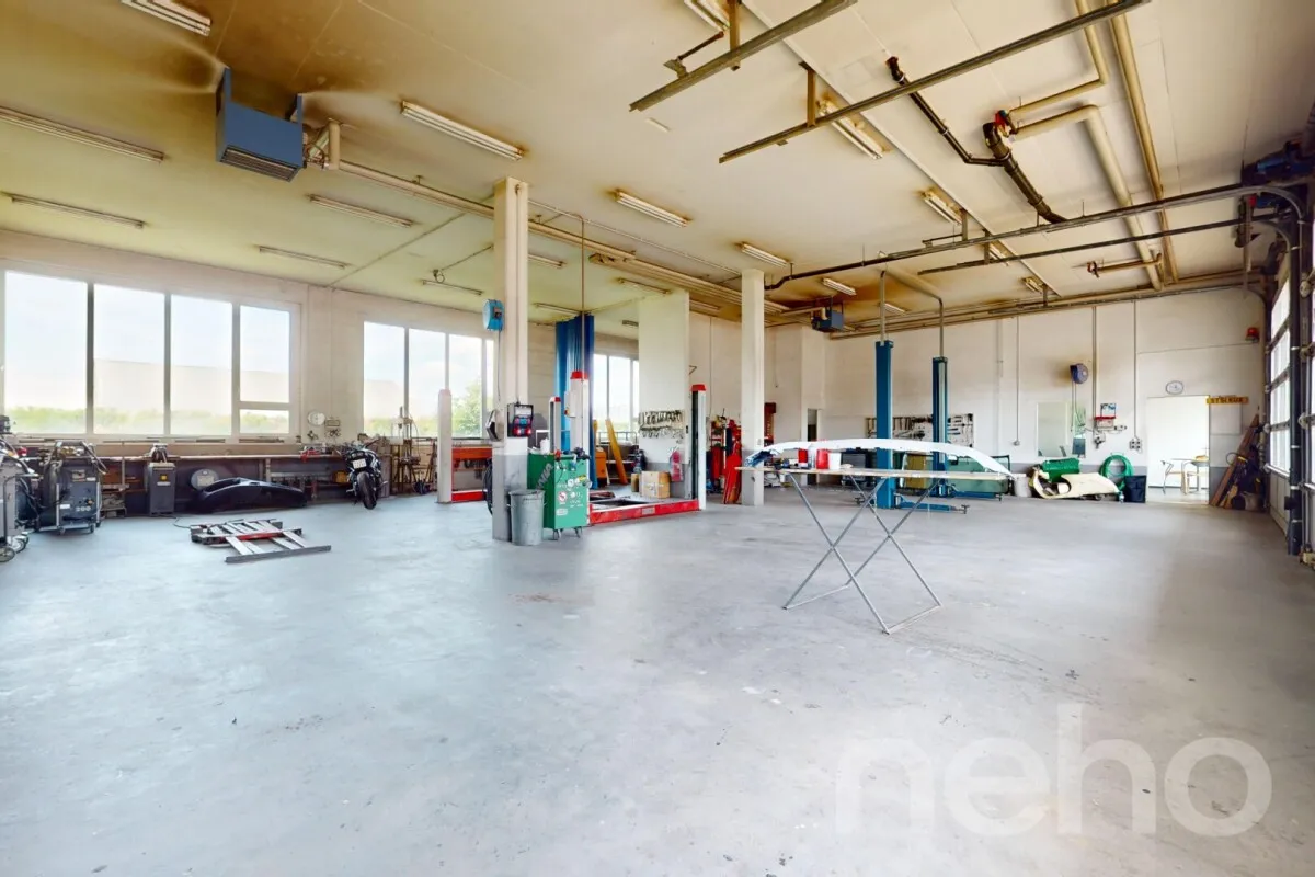 Attraktives Wohn- und Geschäftshaus mit stilvoller Wohnung