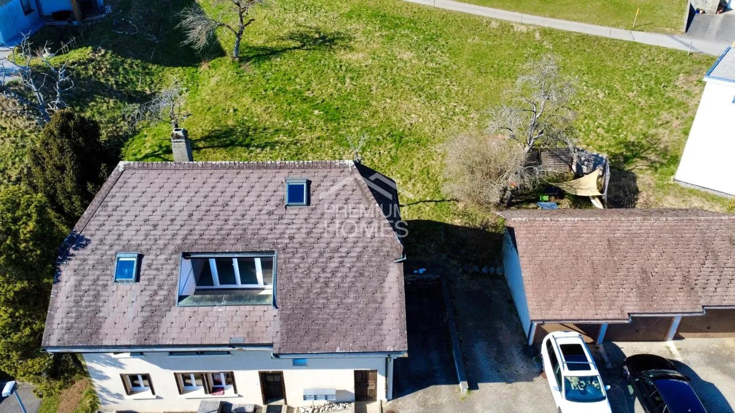 Rarität mit Weitsicht: MFH mit Baulandreserve und Bergblick