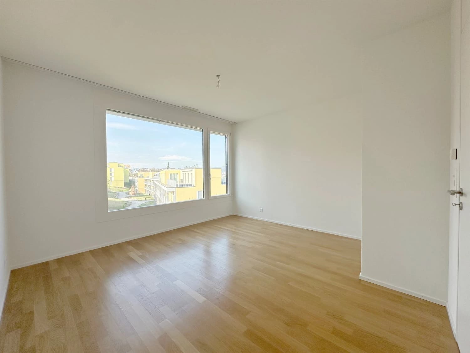 Exklusives Wohnen mit herrlicher Weitsicht auf die Berge und den See