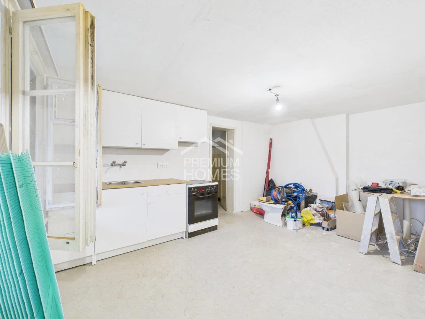 Vielseitiges Mehrfamilienhaus mit Ausbaupotenzial und bewilligter Erwe