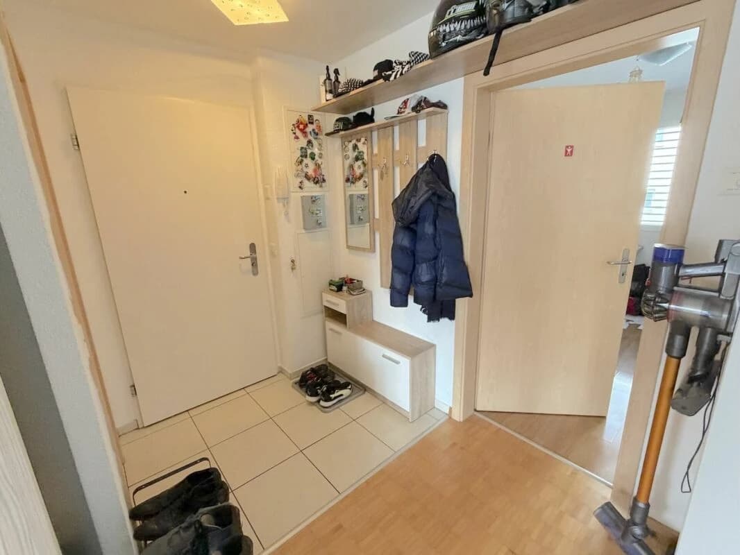 4 ½ Zimmer mit Balkon im 1. OG und 2 Tiefgaragenplätzen