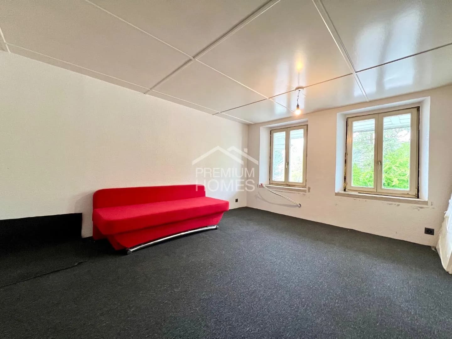 Vielseitiges Mehrfamilienhaus mit Ausbaupotenzial und bewilligter Erwe