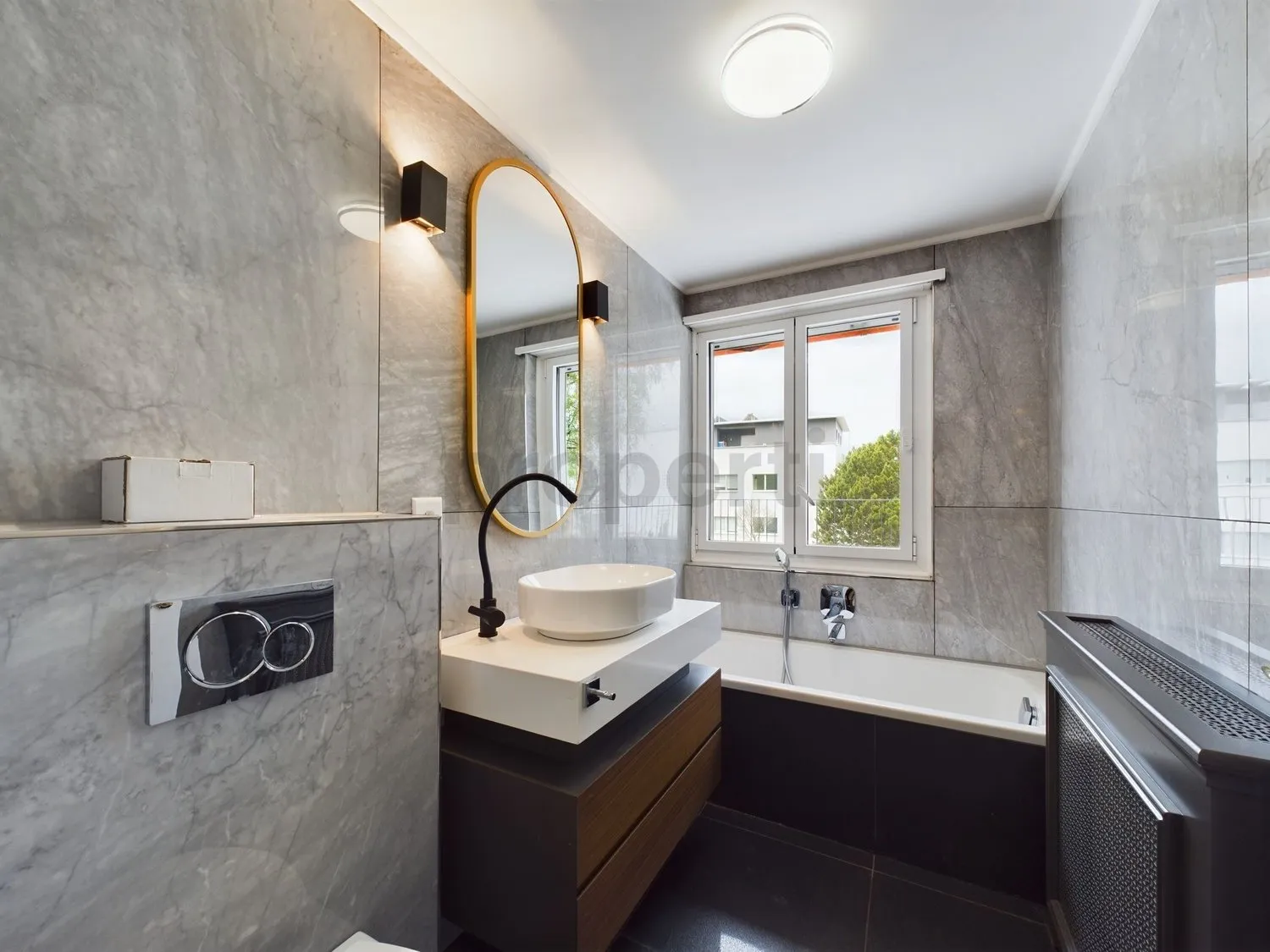 Moderne 4.5 Zimmer-Wohnung mit grosszügiger Terrasse und Garten in Küsnacht