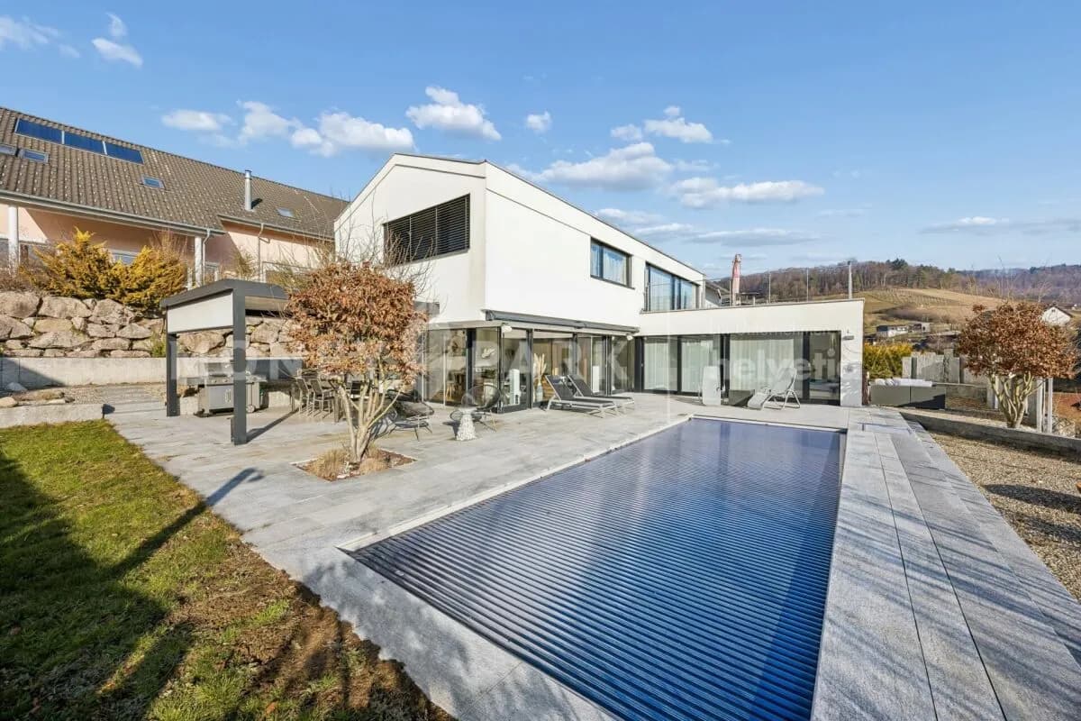 Exklusives 6.5-Zimmer-Architektenhaus - Wohnen in traumhafter Naturlage