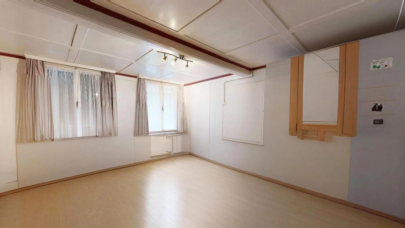 Zweifamilienhaus mit Renovationsbedarf und zusätzlicher Baulandparzelle