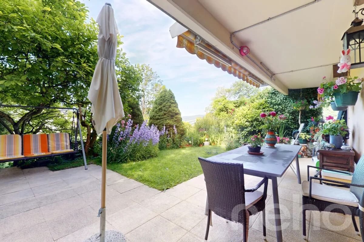 Appartement 4,5 pièces avec jardin, vue montagne et garage