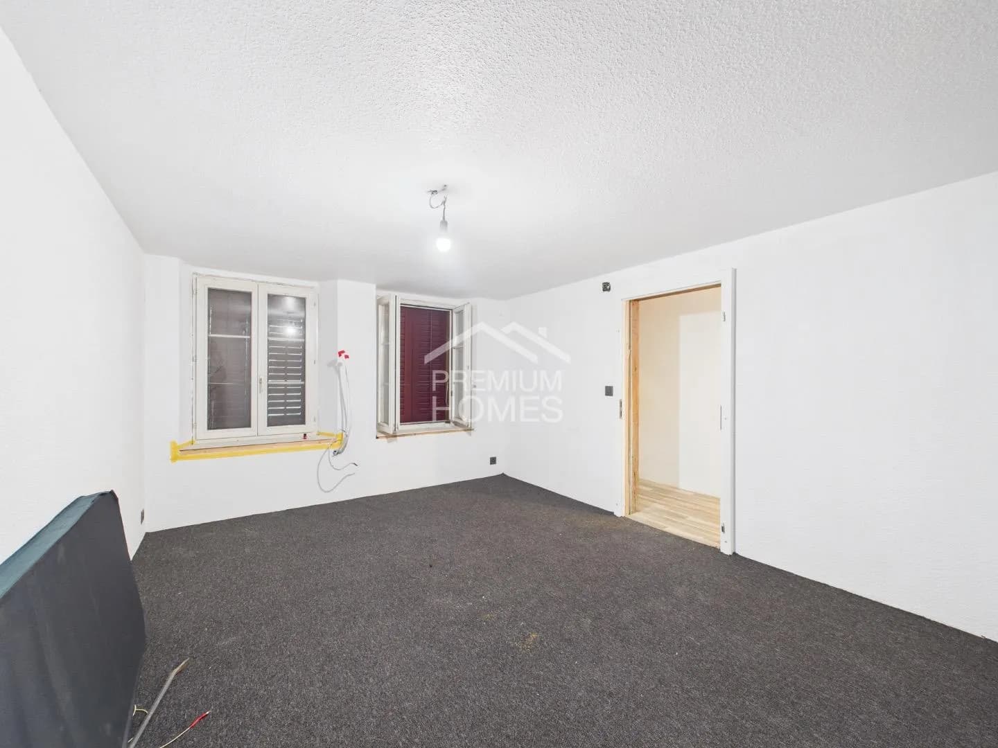 Vielseitiges Mehrfamilienhaus mit Ausbaupotenzial und bewilligter Erwe