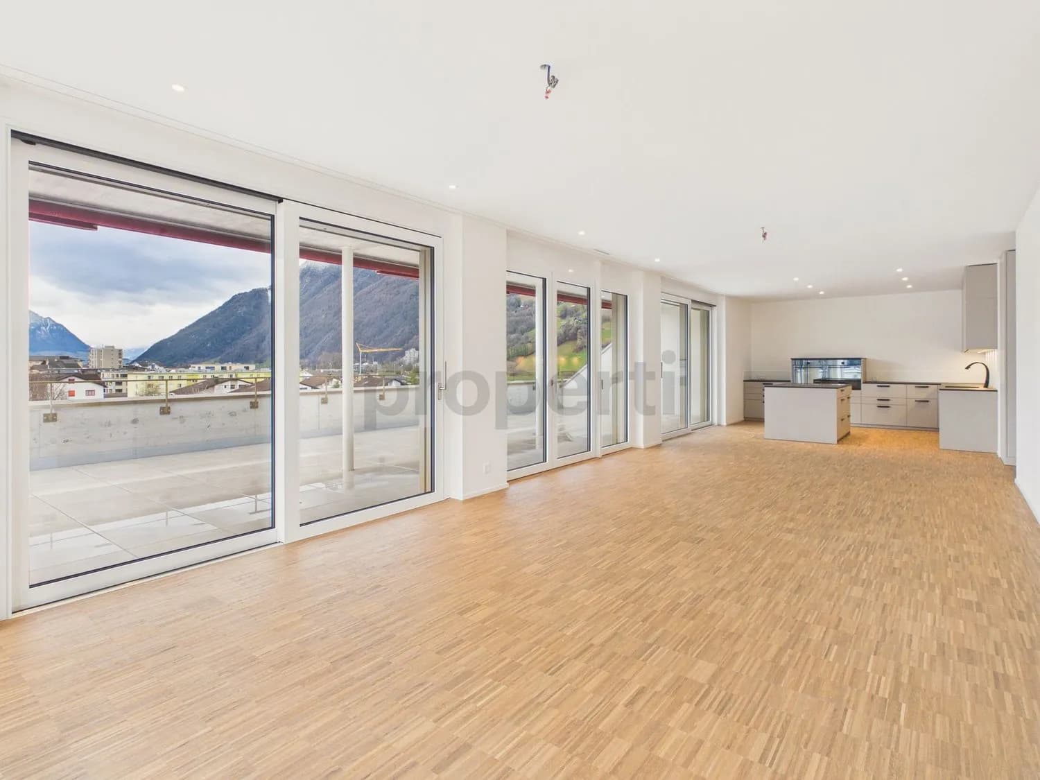 Moderne 4.5-Zimmer-Attikawohnung mit Terrasse, Brunnen