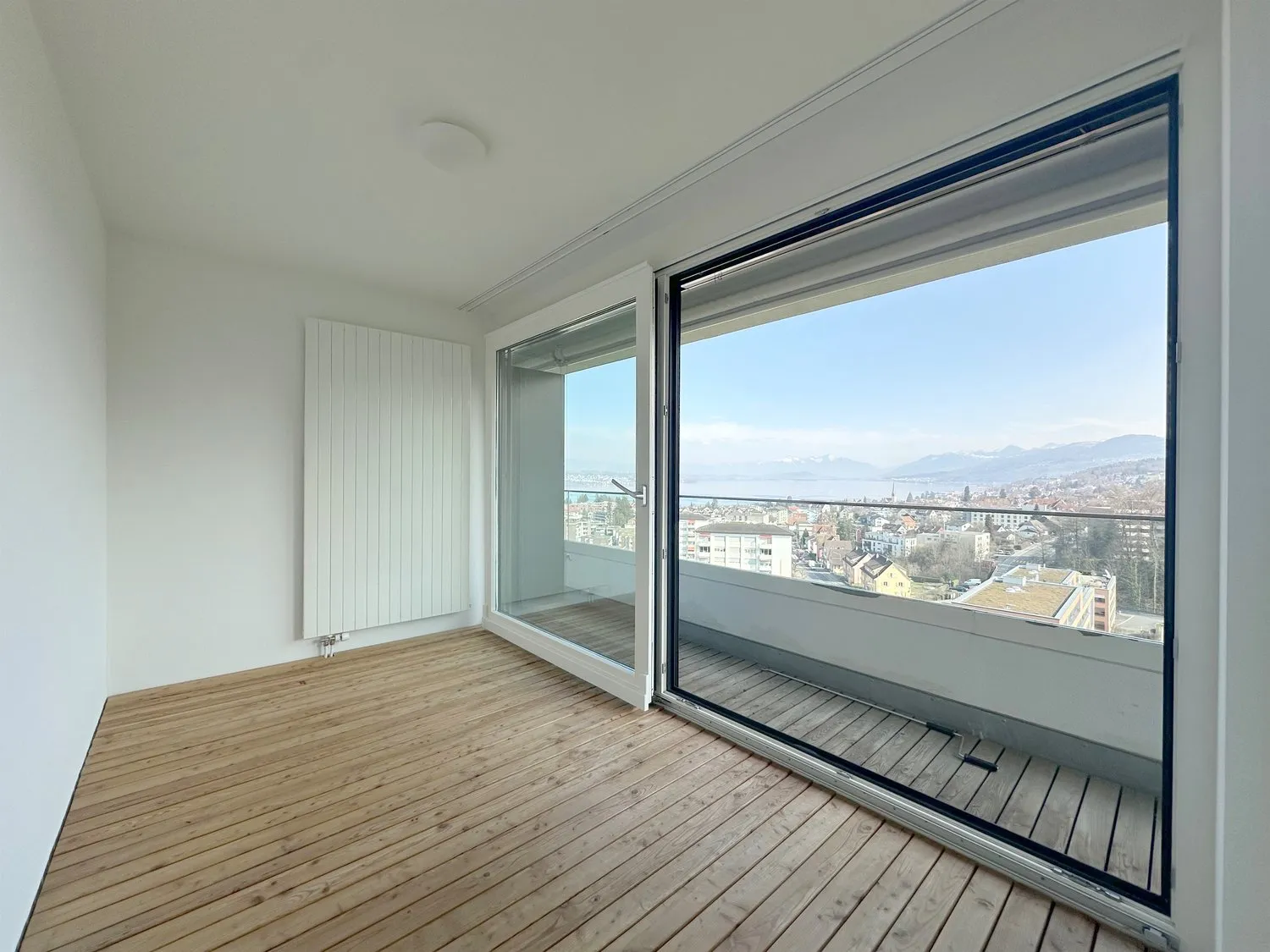 Exklusives Wohnen mit herrlicher Weitsicht auf die Berge und den See