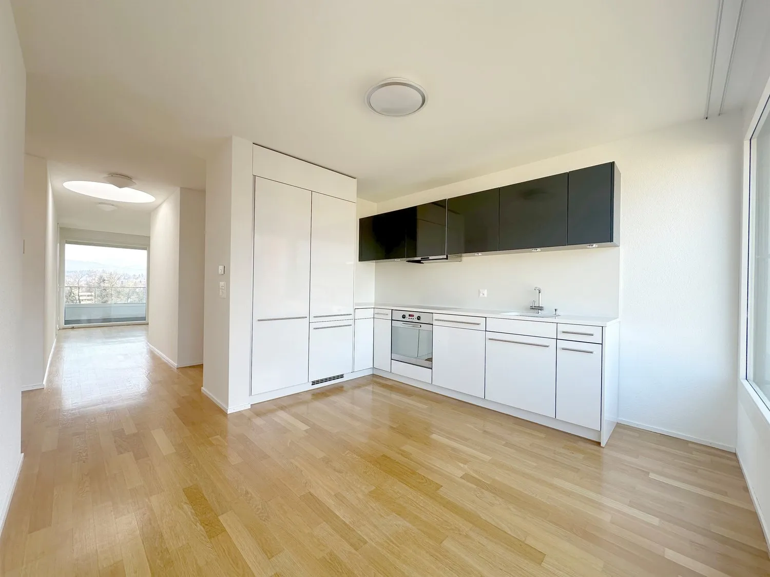 Exklusives Wohnen mit herrlicher Weitsicht auf die Berge und den See