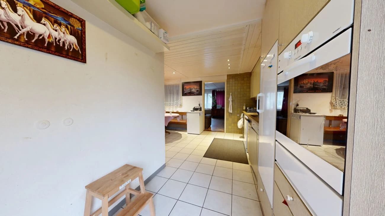 Zweifamilienhaus mit Renovationsbedarf und zusätzlicher Baulandparzelle