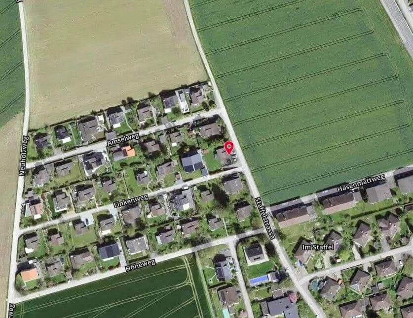 *5,5-Zimmer-Wohnhaus mit Einstellhalle*