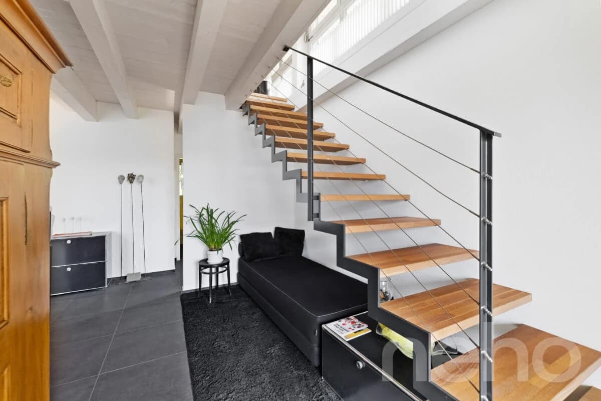 Zweifamilienhaus mit Atelier an zentraler Lage in Orpund bei Biel BE