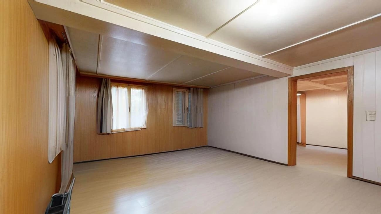 Zweifamilienhaus mit Renovationsbedarf und zusätzlicher Baulandparzelle