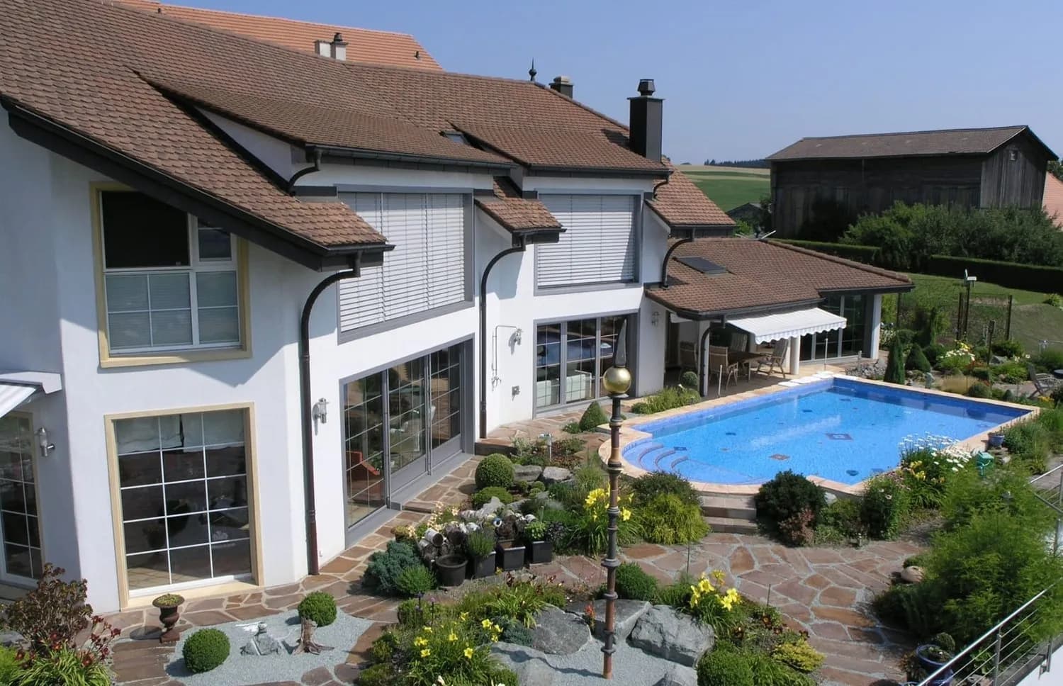7.5-Zi.-Terrassenhaus mit Pool und Seesicht in Bellerive kaufen