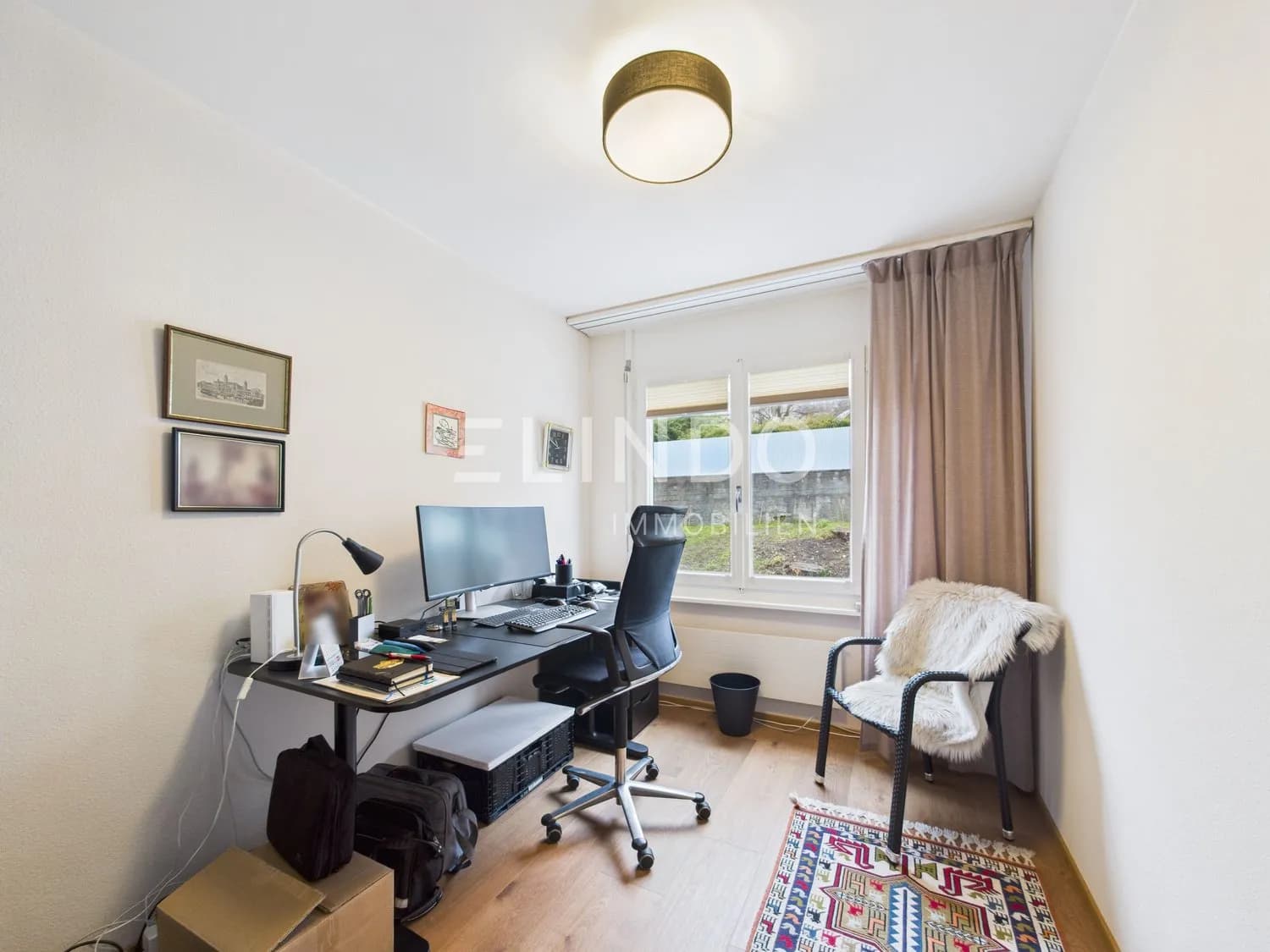 Frisch renovierte 3.5-Zimmer-Gartenwohnung mit Weitsicht in Kilchberg