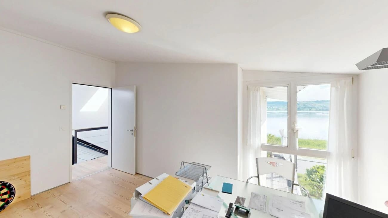 Wohn- und Geschäftshaus: Charmantes Zuhause mit Panoramablick über den Sempachersee