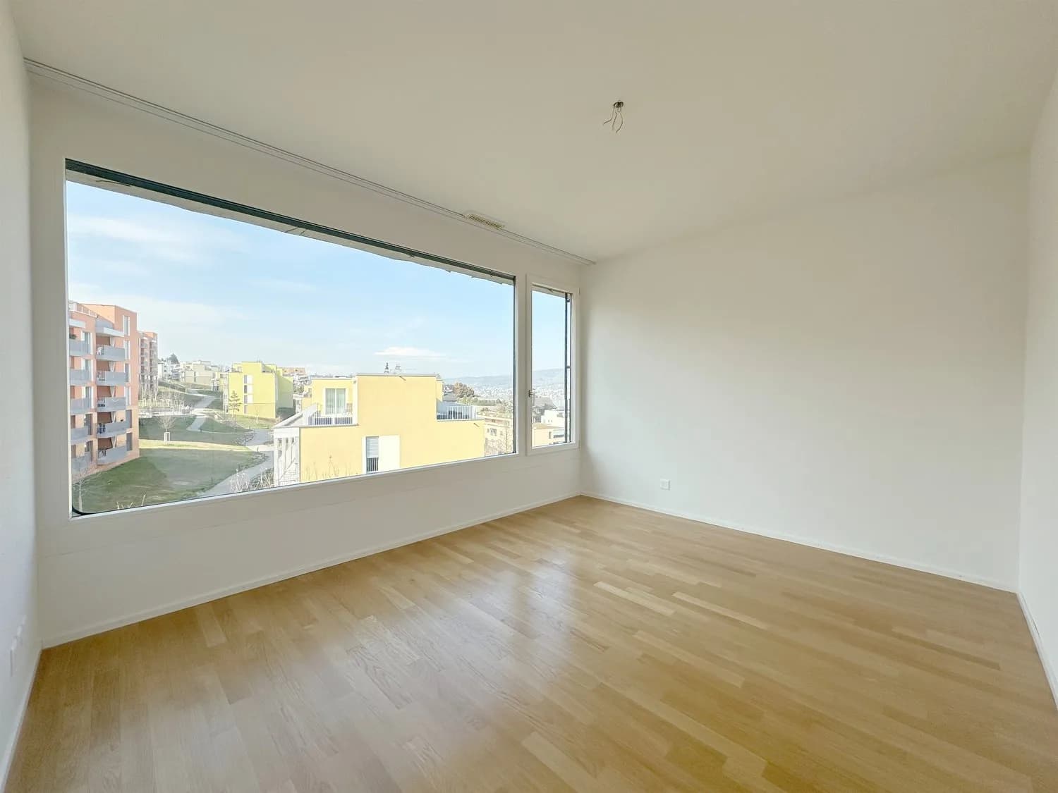 Exklusives Wohnen mit herrlicher Weitsicht auf die Berge und den See