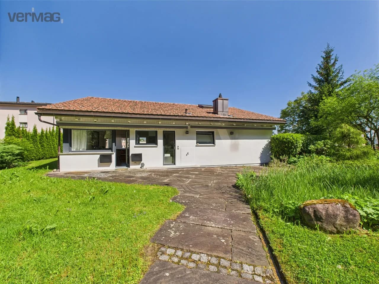 7.5-Zimmer-Einfamilienhaus mit Garten in Wollerau