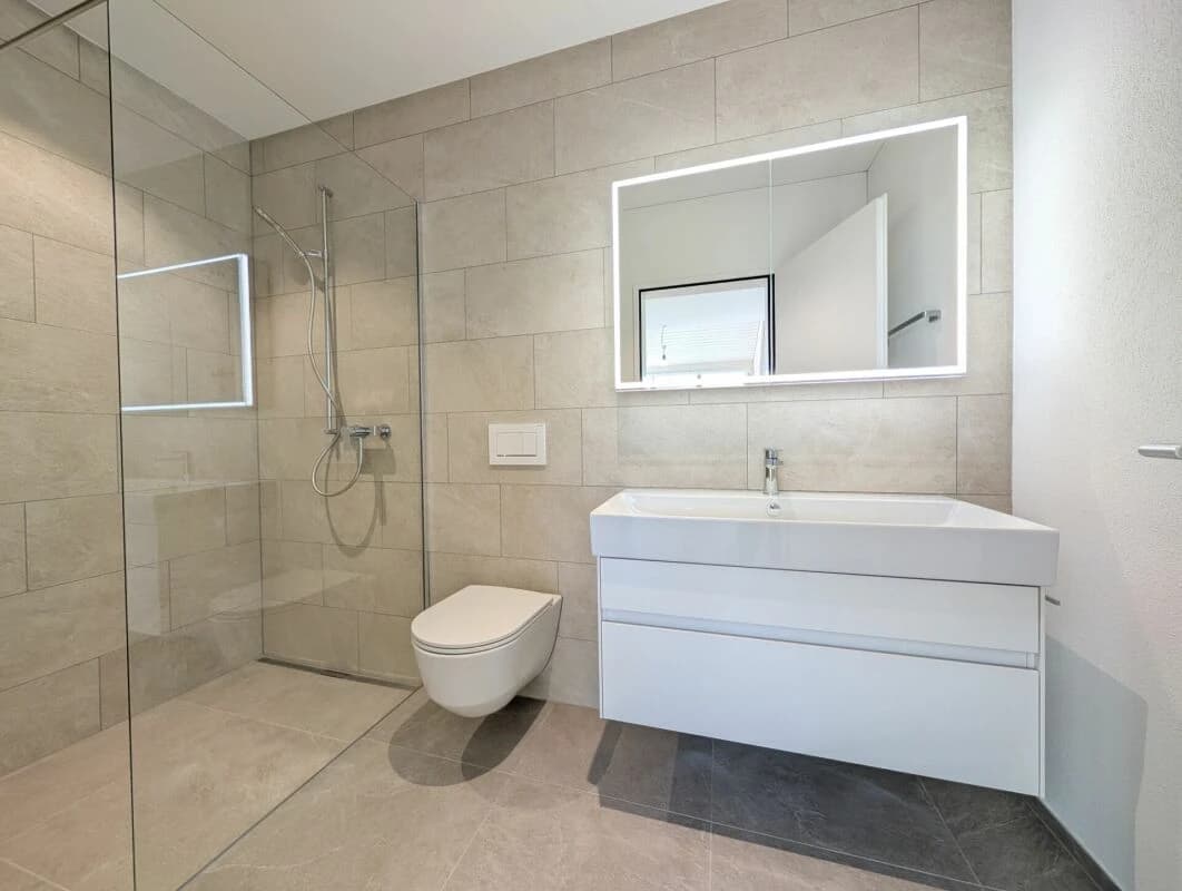 Geniessen Sie die Aussicht über die Dächer von Aesch ZH