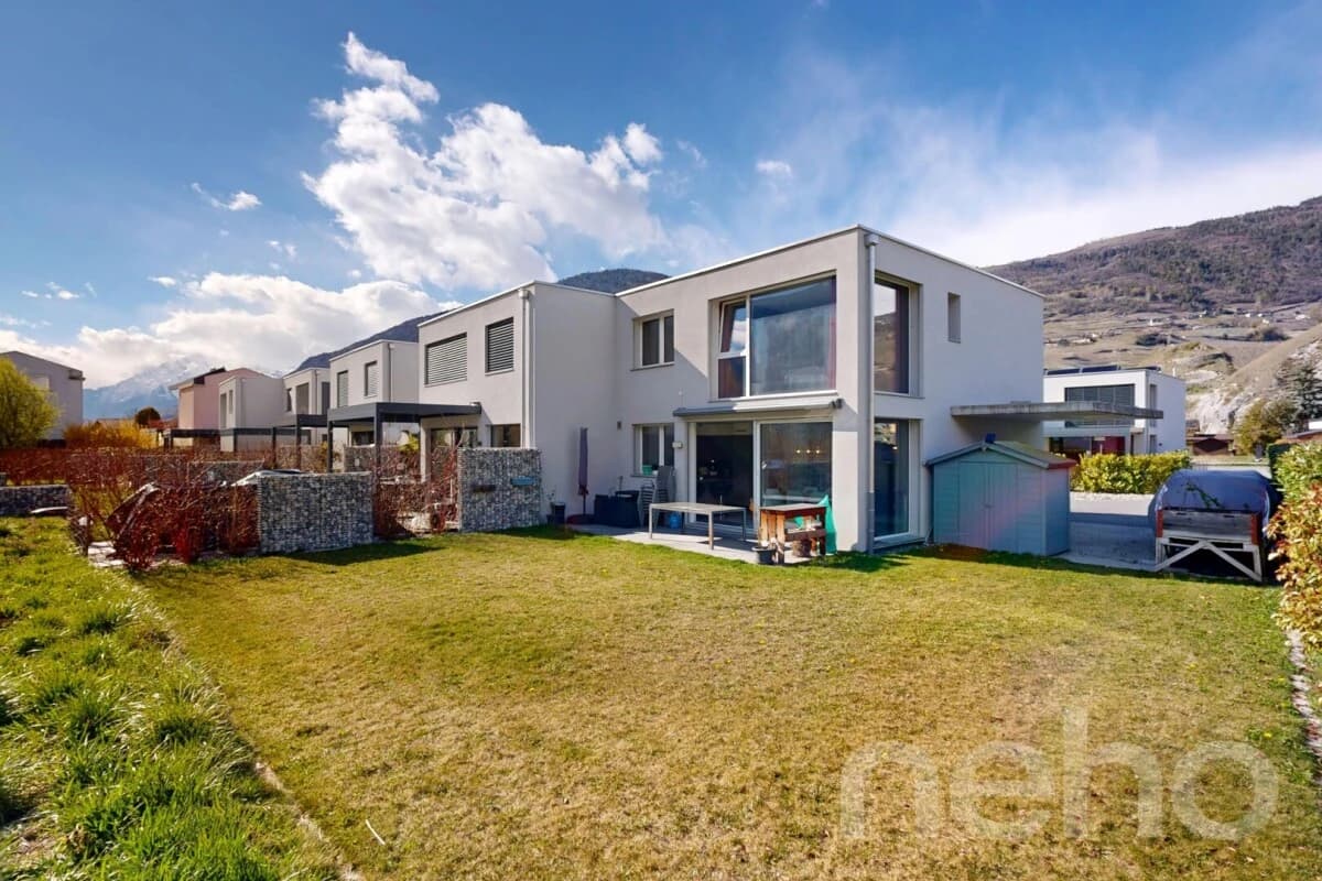 Maison mitoyenne d?exception en bout de rangée