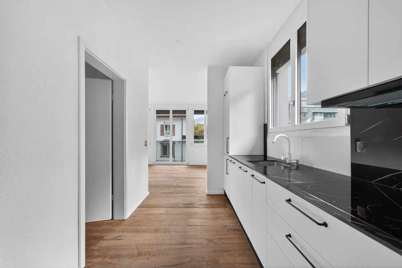 Erstvermietung - Hochwertig kernsanierte 2.5-Zimmer-Wohnung im EG