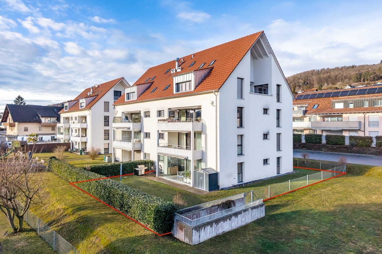 Moderne 4.5-Zimmer-Gartenwohnung mit Wintergarten und Gartenfläche